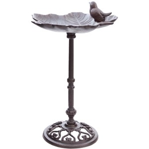Dunkelbraune Vogeltränke aus Gusseisen mit Vogel auf Blatt und Standfuß, 36 cm hoch.