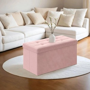 Rosa Songmics Sitzbank Minota aus Samt mit Stauraum vor Sofa.