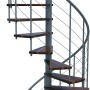 Spindeltreppe Venezia Smart, Walnuss-Holzstufen, graues Metallgeländer, für Innenräume.