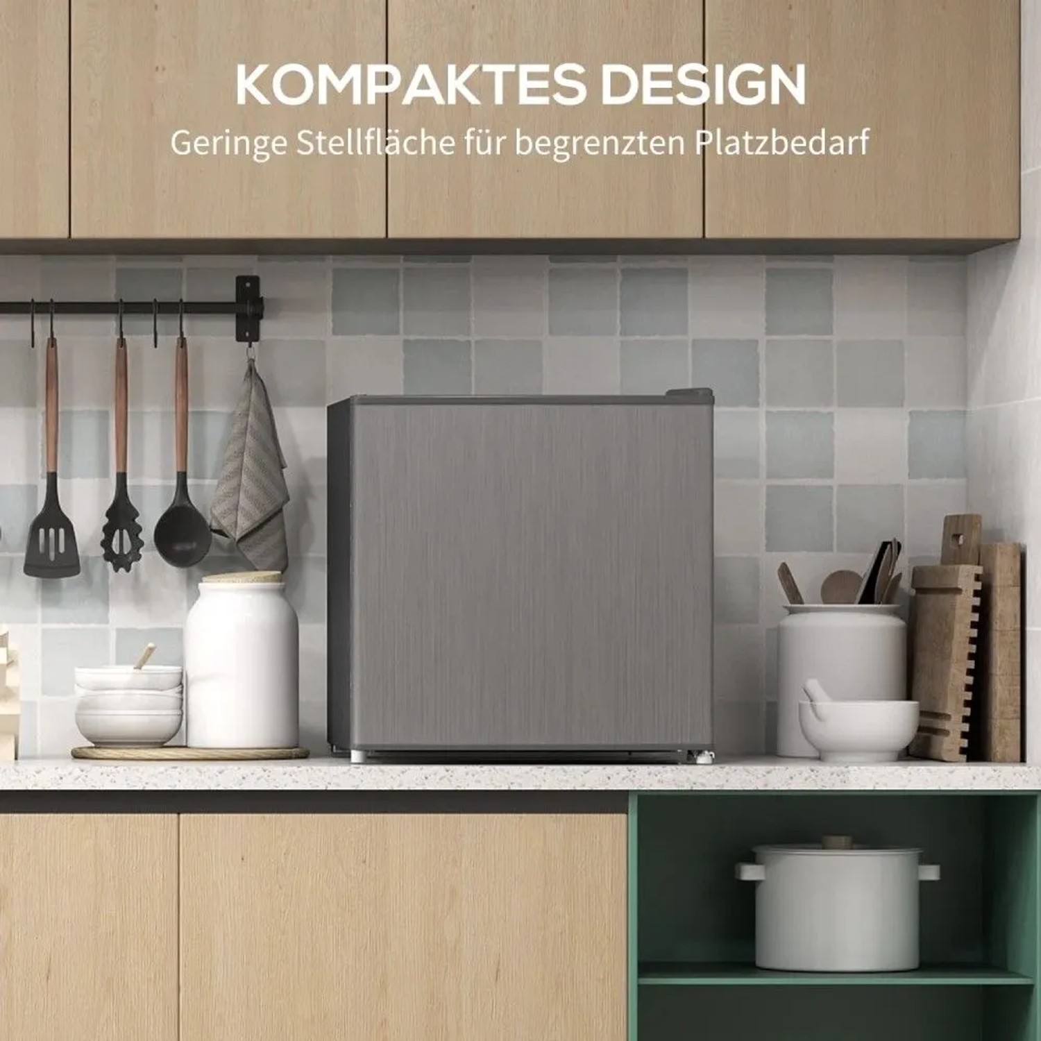 Grauer HOMCOM Mini-Gefrierschrank 35 L auf Küchenarbeitsplatte. Kompakte Gefrierbox freistehend für kleine Räume.