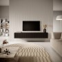 Schwarzes Selsey TV-Hängeboard Veldio mit Lamellenfront unter einem TV in einem modernen Wohnzimmer. Wandmontierter TV-Schrank.
