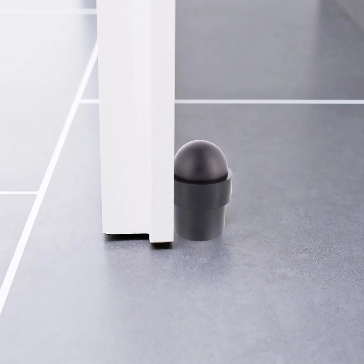 Schwarzer, matter Wagner Bodentürstopper Dom aus Metall (Ø 35 mm) schützt Tür und Wand.