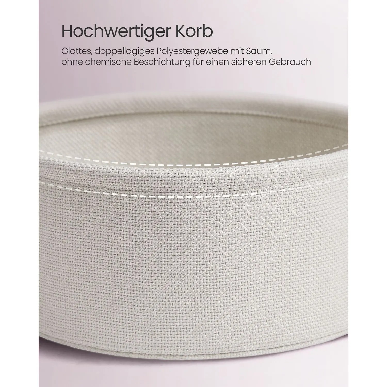 Detailaufnahme: Stoffkorb des Vasagle Beistelltischs in Rosa-Weiß.
