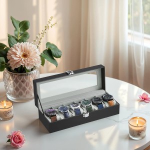 Schwarze Songmics Uhrenbox Bridie mit 6 Fächern und transparentem Deckel zur Aufbewahrung von Uhren.