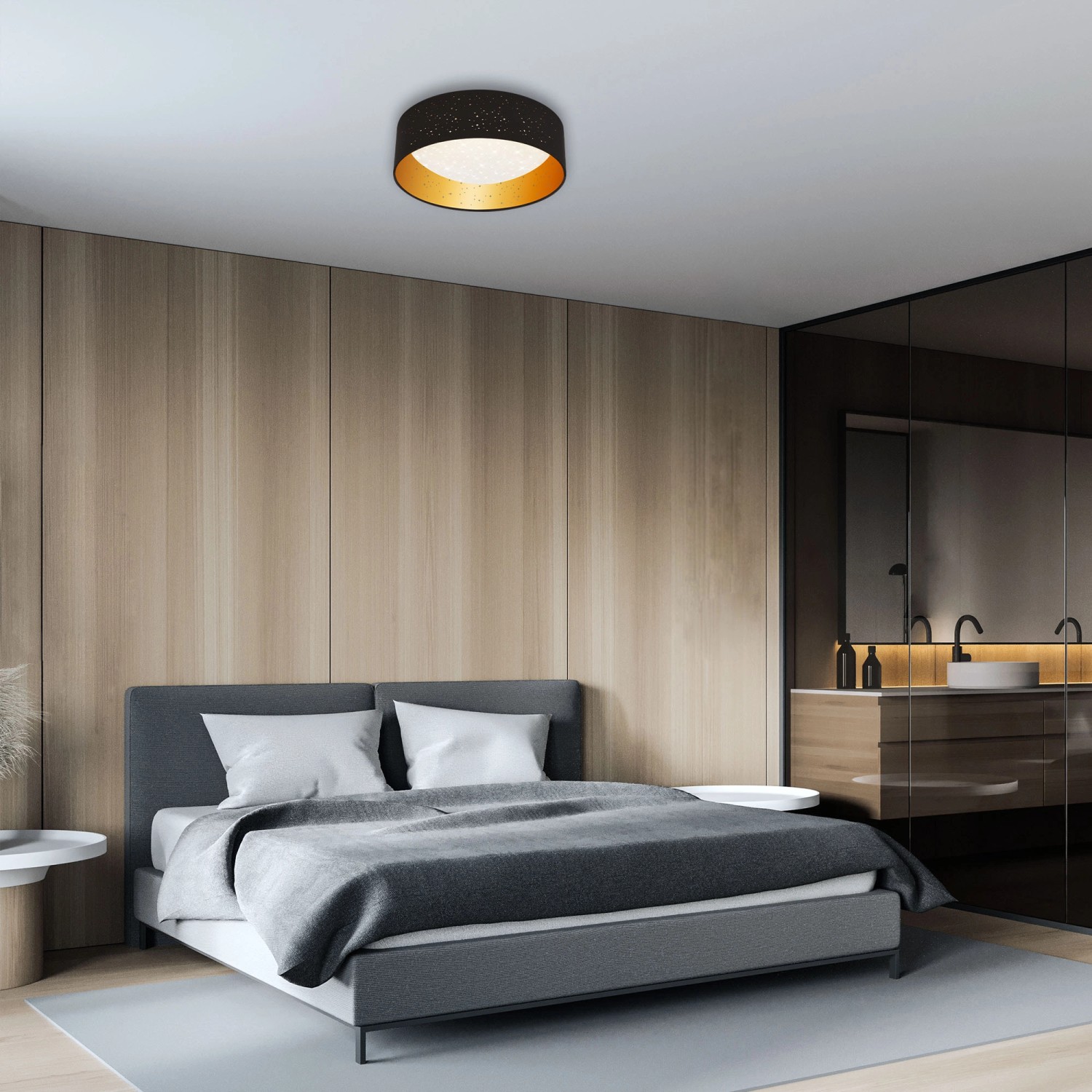 Brilo LED-Deckenleuchte Maila, Ø 32 cm, schwarz-gold mit Sternenhimmel-Effekt.