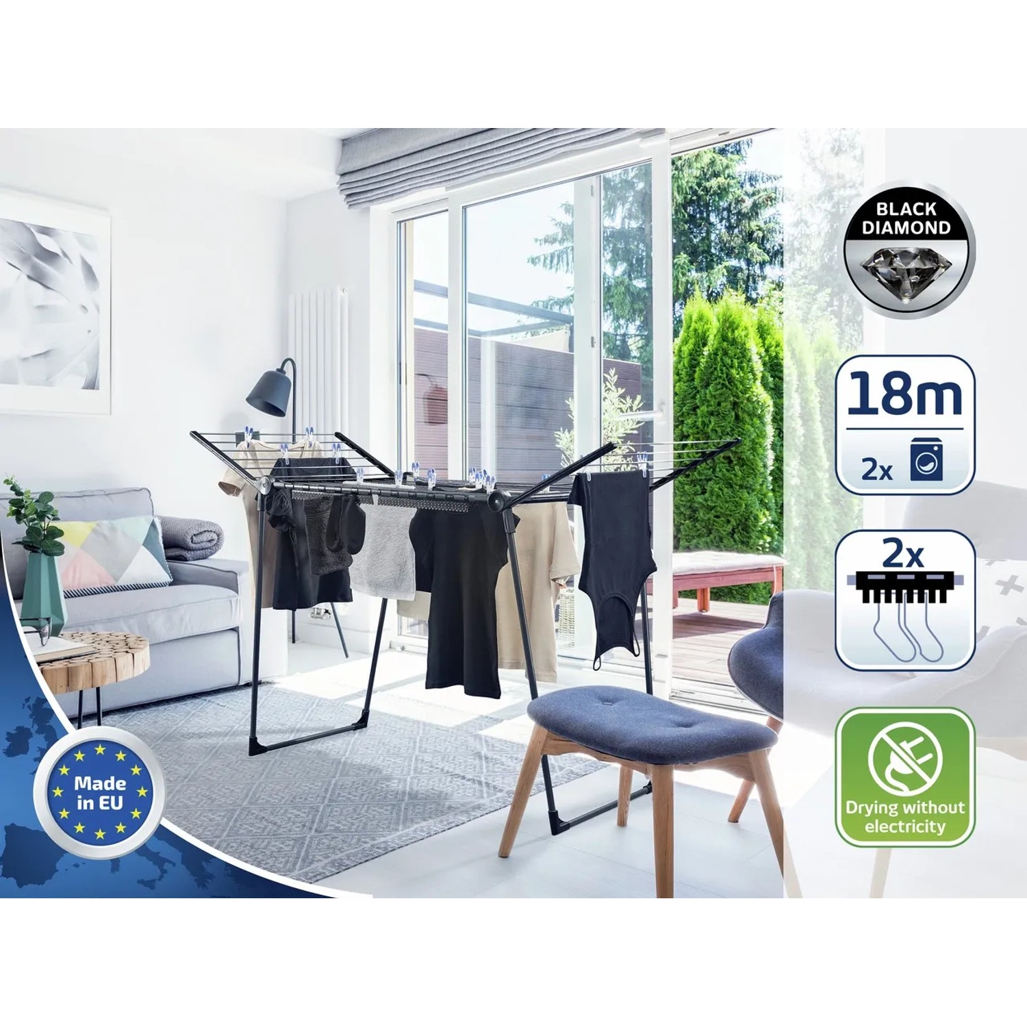 Leifheit Standtrockner Pegasus 180 in Schwarz-Anthrazit mit Wäsche im Wohnraum.