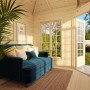 Innenansicht: Palmako Holz-Pavillon Melanie mit Fußboden, Sofa und Fenster.