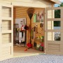 Offenes Karibu Holz-Gartenhaus Timra mit Satteldach und Gartengeräten.