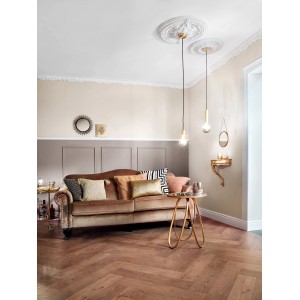 Wohnraum mit Zierprofil Giuseppina Weiß an Decke und Wand.