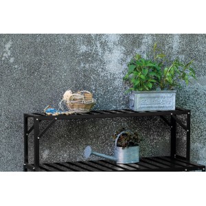 Schwarzes Halls Top Regal für Standalone-Tisch mit Pflanzen und Gartenzubehör.
