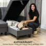 Dunkelgraues HOMCOM Ecksofa mit offener Stauraum-Chaiselongue. Eine Frau verstaut Decken im Fach. Ideal für Sofas mit Schlaffunktion.