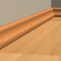 Holzfarbene Sockelleiste an Wand und Boden befestigt. Ideal zum Kleben mit Fischer Kleber.