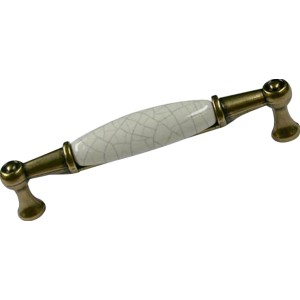 Möbelgriff 1699 aus Metall mit Keramik-Element in Beige und Altmessing-Optik.