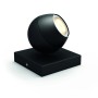Schwarzer Philips Hue White Ambiance LED Spot Buckram mit warmweißem Licht.