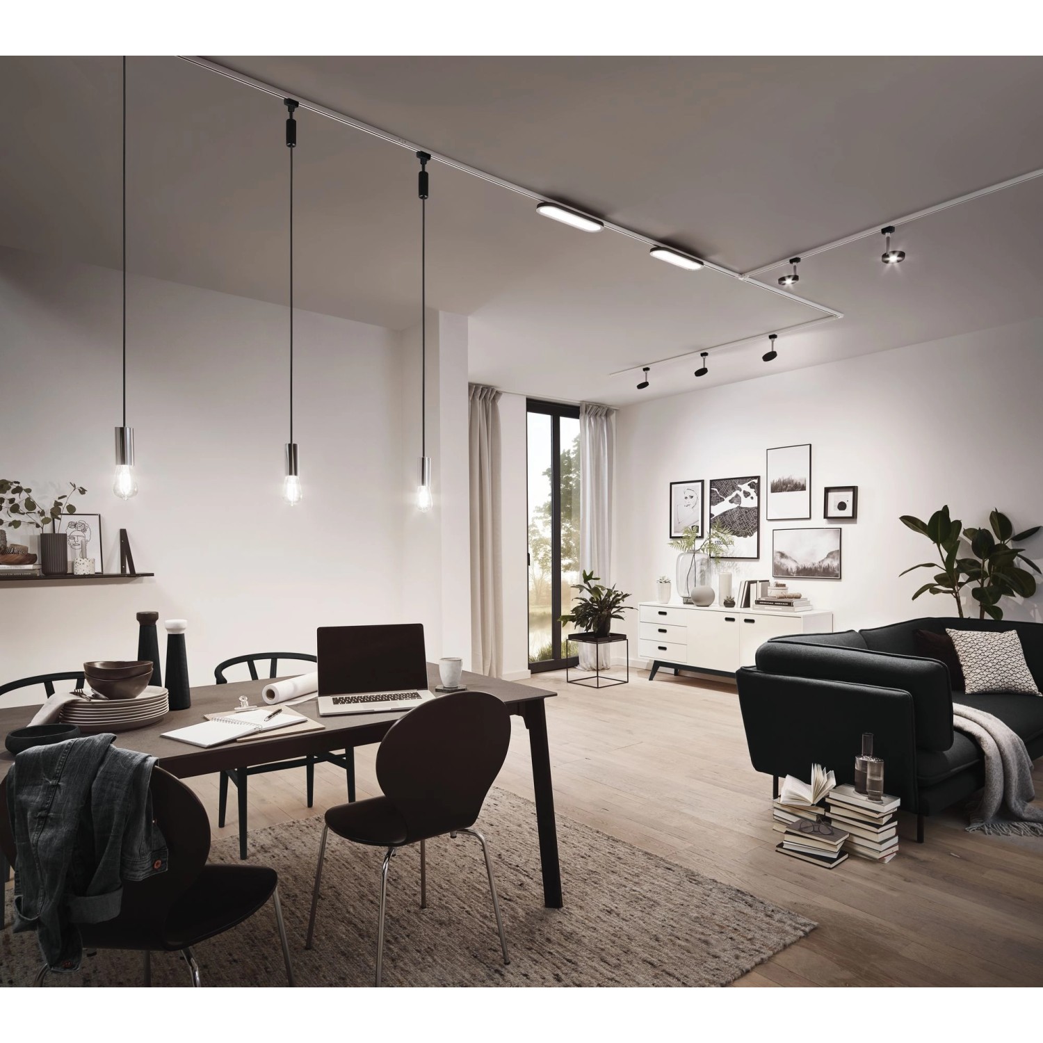 URail Schienensystem mit drei schwarzen Paulmann 2Easy Pendelleuchten über Esstisch in Wohnraum.