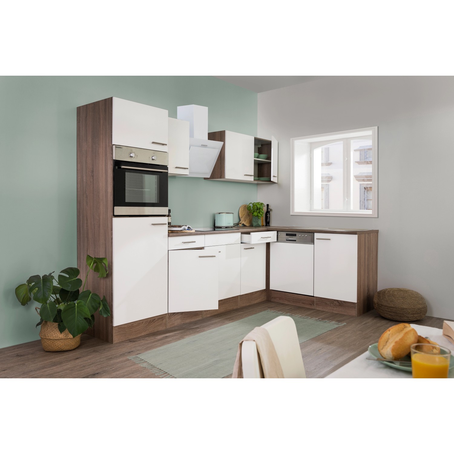 Respekta Winkelküche in Weiß Seidenglanz und Eiche York Optik mit E-Geräten.