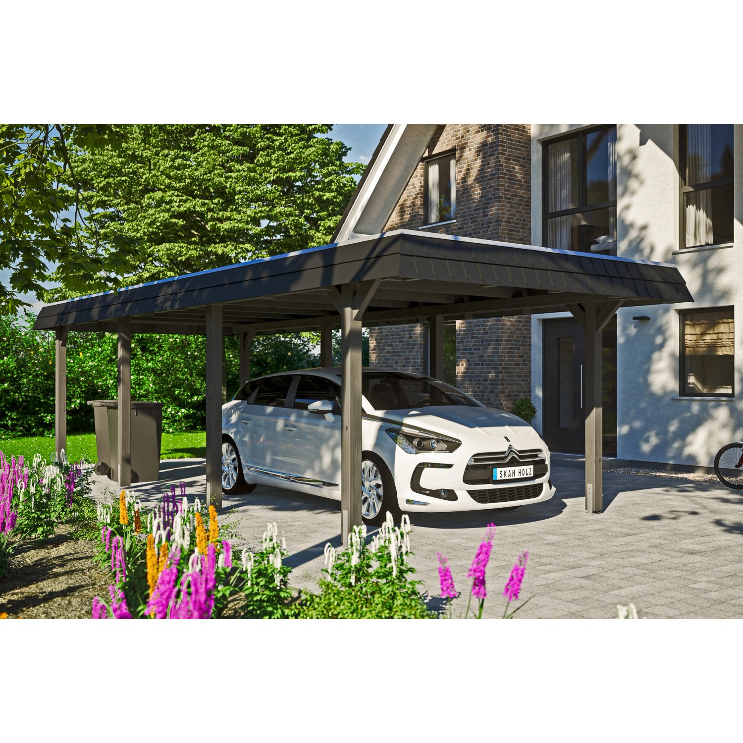 Skan Holz Carport Wendland in Schiefergrau mit Aluminiumdach und schwarzer Blende. Auto steht im Carport.