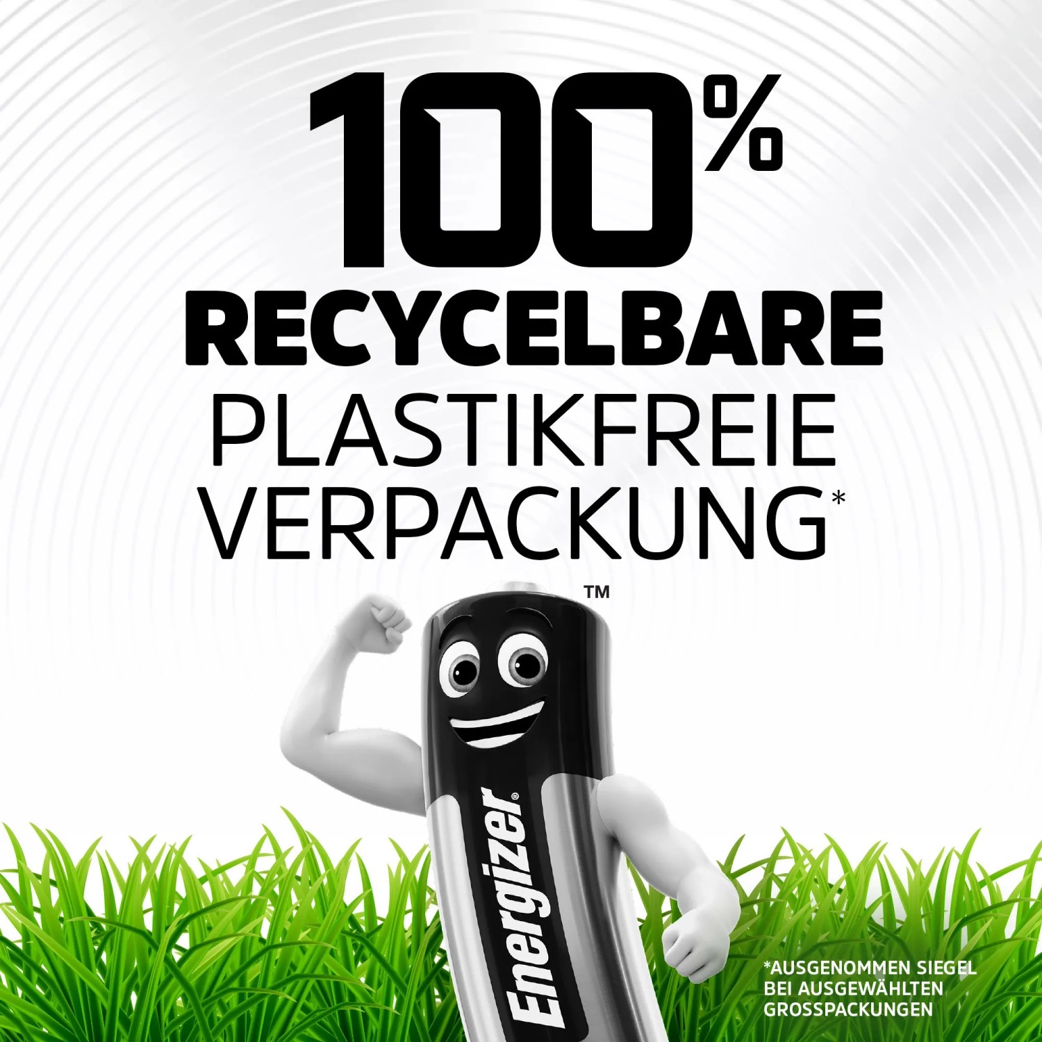 Motiv: Energizer Batterie mit Gesicht und Armen vor Gras, Text "100% recycelbare, plastikfreie Verpackung".
