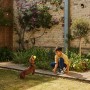 Yale Bewegungsmelder Smart Alarm im Garten mit Kind und Dackel beim Ballspiel.