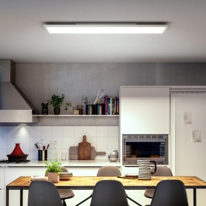 Philips Hue Aurelle LED-Panel, 120x30 cm, Weiß, in moderner Küche über Esstisch.