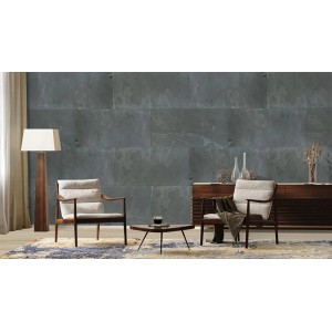 Schwarze Echtstein-Paneele Real Stone als Wandverblender in modernem Wohnzimmer. Naturstein-Optik für stilvolle Akzente.