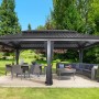 Anthrazitfarbener Sojag Aluminium Pavillon Messina 12 x 20 mit Moskitonetz und Gartenmöbeln.