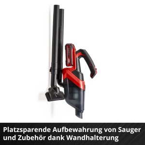 Einhell Akku-Handstaubsauger TE-HV 18/06 Li-Solo rot-schwarz mit Zubehör an Wandhalterung.