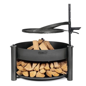 Schwarze CookKing Feuerschale Montana X mit Holzlager und Zubehörhalterung.