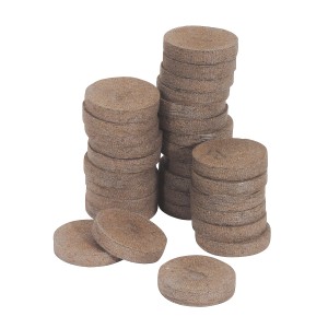 Quelltabs 3,5 cm Ø, 50 Stück für die Pflanzenanzucht. Kokos-Tabletten gestapelt.