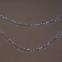 OBI Außen Lichterkette mit 700 kaltweißen LEDs, dekorativ für Garten und Terrasse. Lange LED-Lichterkette.
