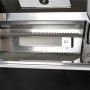 Detailaufnahme: Buschbeck Outdoorküche Bradford mit Edelstahl-Grillrost und Warmhalterost.