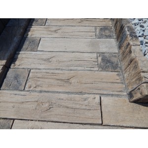 Häusler Schwelle Versteinertes Holz, 75x25x5 cm, braun, in Holzoptik als Terrassenplatte.