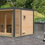 Karibu Saunahaus Seros 3, naturbelassen/anthrazit, mit Ofen und Steuerung im Garten.