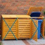 Erweiterung für Vario III Mülltonnenbox in Honigbraun, aus Holz mit einer blauen Mülltonne.