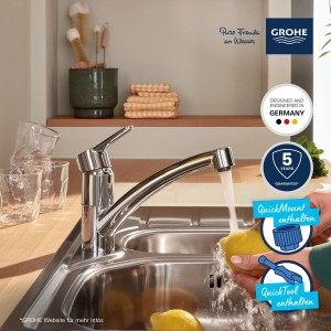 Grohe QuickFix Start Eco Spültischarmatur in Chrom, Wasserhahn beim Reinigen einer Zitrone.