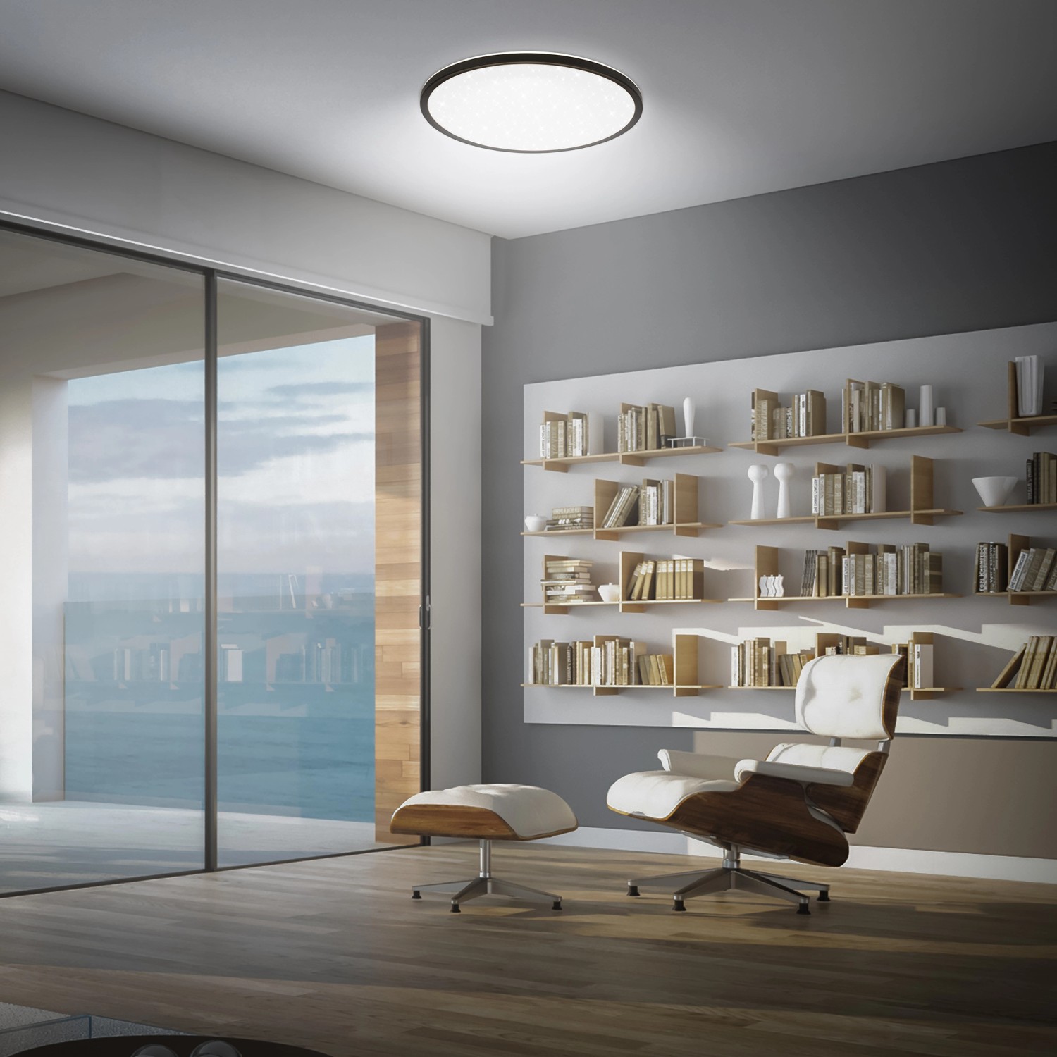 Schwarzes Brilo LED-Panel Slim Sternenhimmel, neutralweiß, Ø 37,5 cm, an der Decke montiert.
