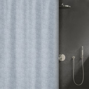 Blauer Spirella Elements Duschvorhang Ilo (180x240cm) mit feiner Struktur im Badezimmer.