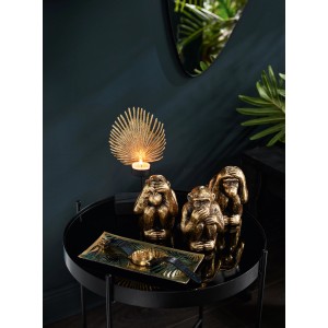 Gold-schwarzes Dekoblatt Dark Wonder (21x14x15cm) als Kerzenhalter auf schwarzem Tisch.