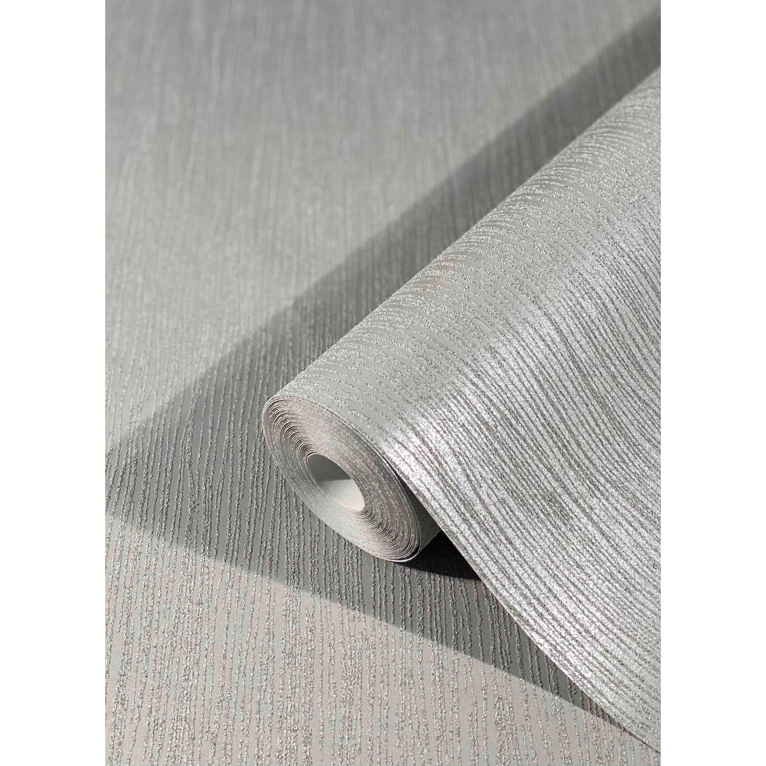 Graue Marburg Vliestapete Dune mit feiner Struktur, Rolle angeschnitten.