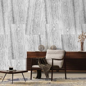 Check Echtstein-Paneel Real Stone Marmor 122x61 cm, hellgrau mit dunkler Maserung, als stilvolle Wandverkleidung im modernen Wohnzimmer.