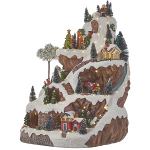 Beleuchtete Ski Landschaft Miniatur mit Häusern, Bäumen und beweglichen Figuren als Weihnachtsdekoration.