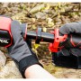 Skil Akku-Astsäge 0514CA: Teleskop-Funktion in Aktion, rot/schwarz, ohne Akku.