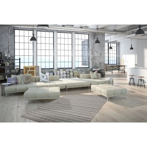 Naturfarbener Wollteppich Kaylana, 160x230 cm, im Wohnzimmer mit Sofa.