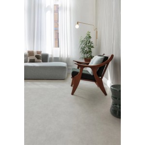 Grauer Andiamo PVC-Bodenbelag Allover 591 Stellar, verlegt in modernem Wohnraum.