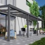 Anthrazitfarbene Terrassenüberdachung Professional mit Glasdach, 700x250 cm. Robuste Bauweise.
