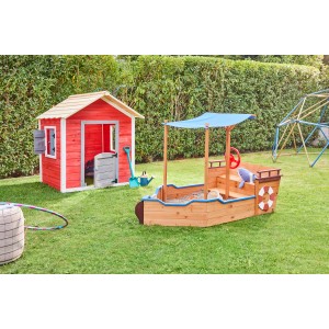 Home Deluxe Sandkasten Matschekiste in Schiffsform mit Sonnendach im Garten.