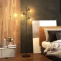 Moderne schwarze Stehlampe mit drei verstellbaren Leuchten und geometrischen Metallschirmen für Innenräume.
