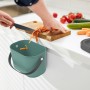 Rotho Bioabfallbehälter Albula in Mistletoe Green, hängend in der Küche.