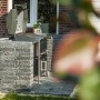 Diephaus Mauerstein Collo Basalt als Grillumrandung im Garten.