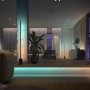 Philips Hue Lightstrip Gradient Ambience 1m Erweiterung im Wohnraum mit Farbverlauf.